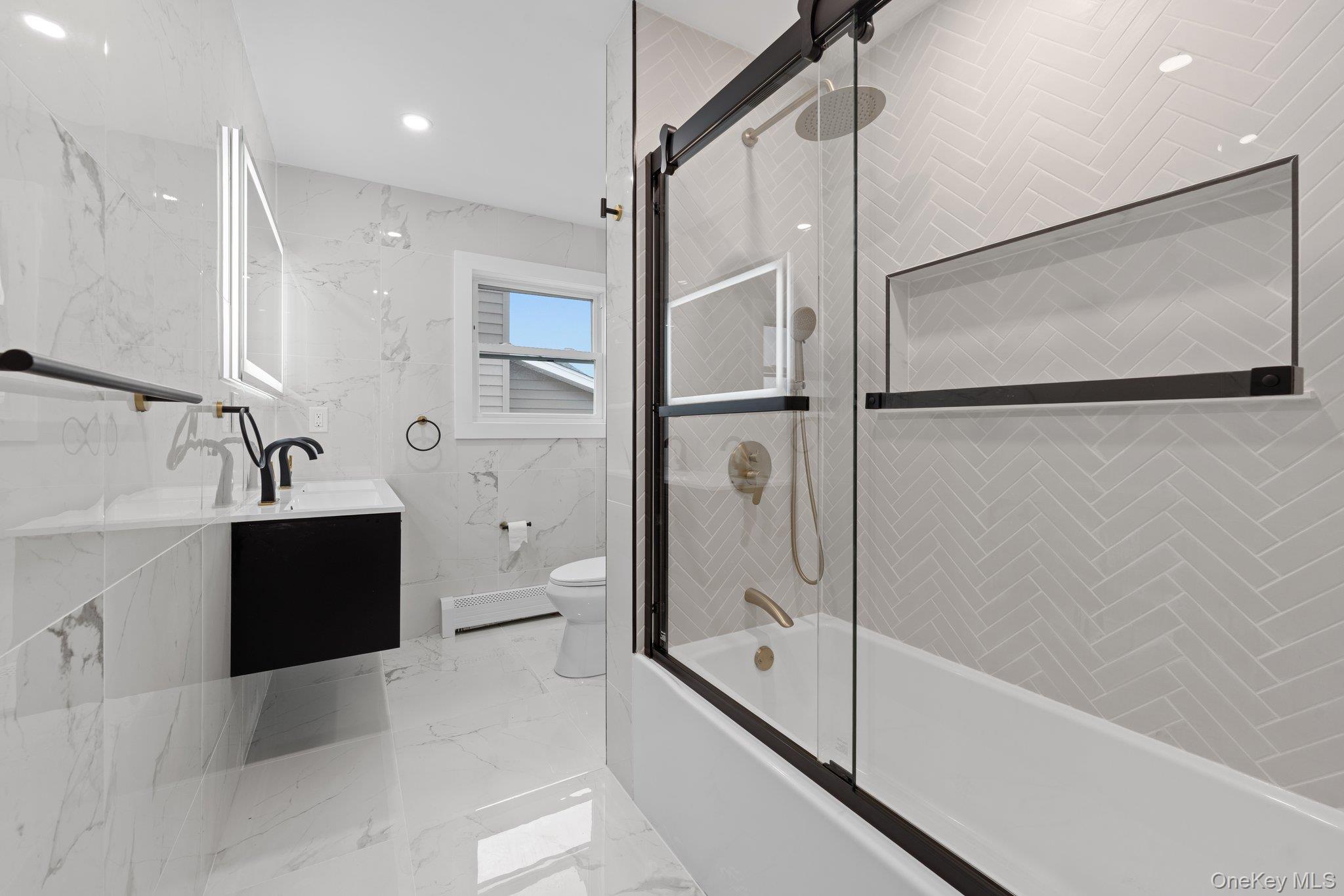 46 Mt Grey Road Stony Brook, NY 11790 - Photo 9 of 15 a spacious bathroom with a tub shower and mirror