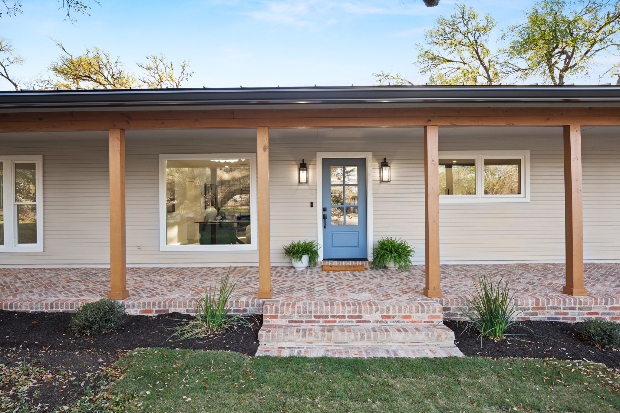 404 Bittern Drive Buda, TX 78610 - Photo 2 of 34 a front view of a house with garden
