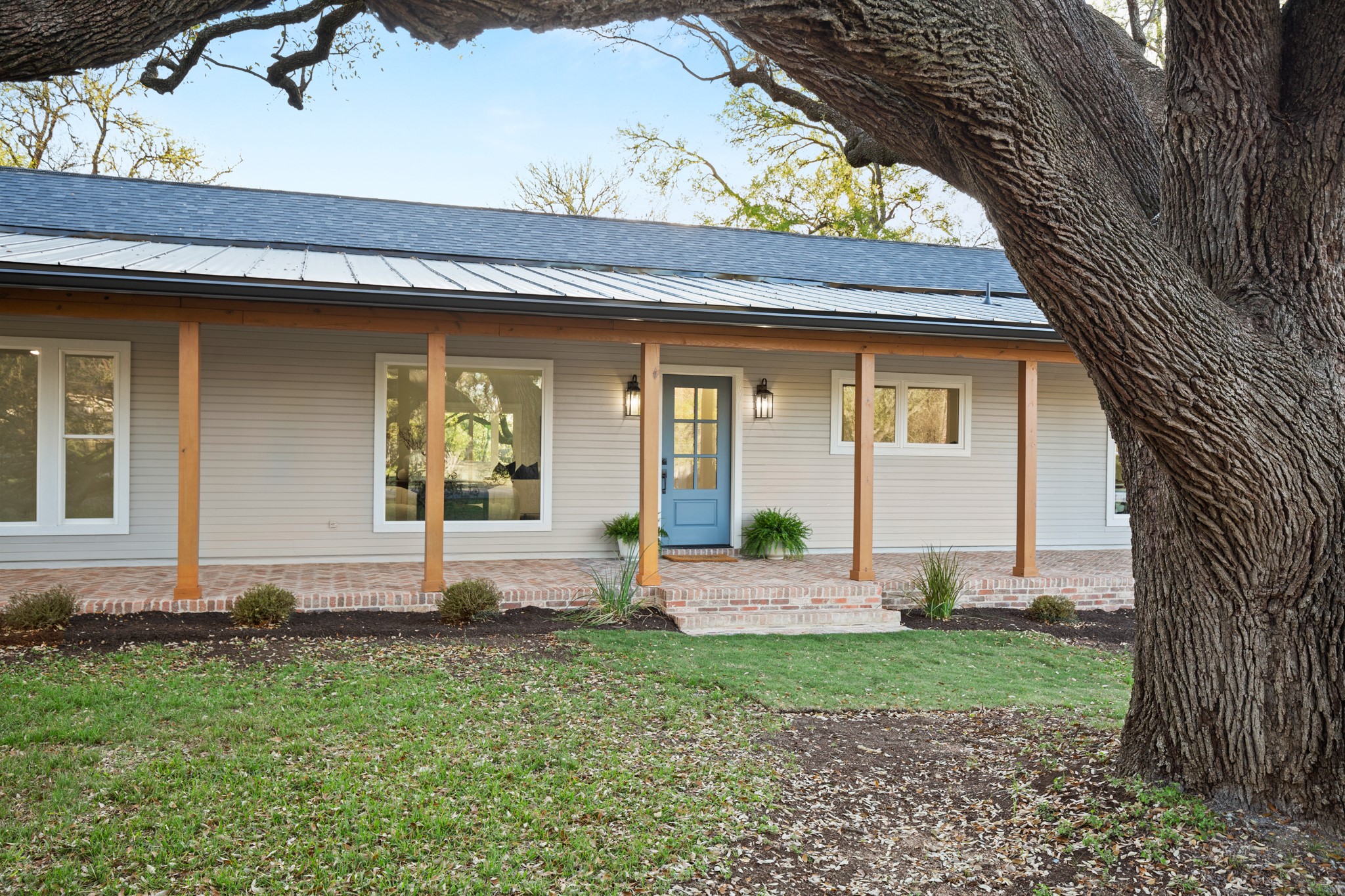 404 Bittern Drive Buda, TX 78610 - Photo 7 of 34 a front view of a house with garden