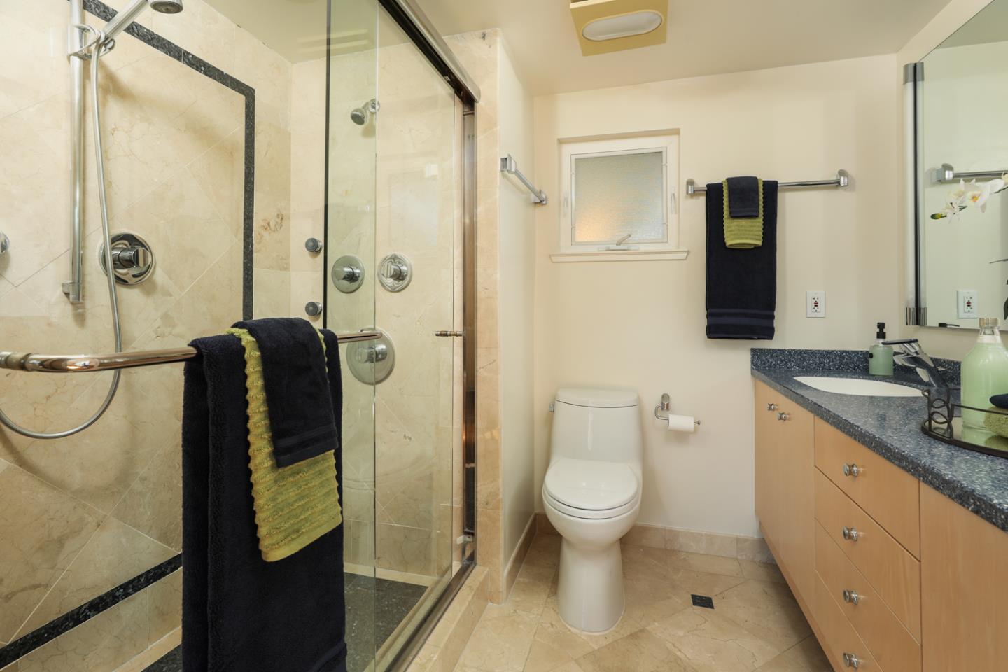 1722 Walnut Drive Mountain View, CA 94040 - Photo 19 of 35 a bathroom with a granite countertop sink toilet and shower