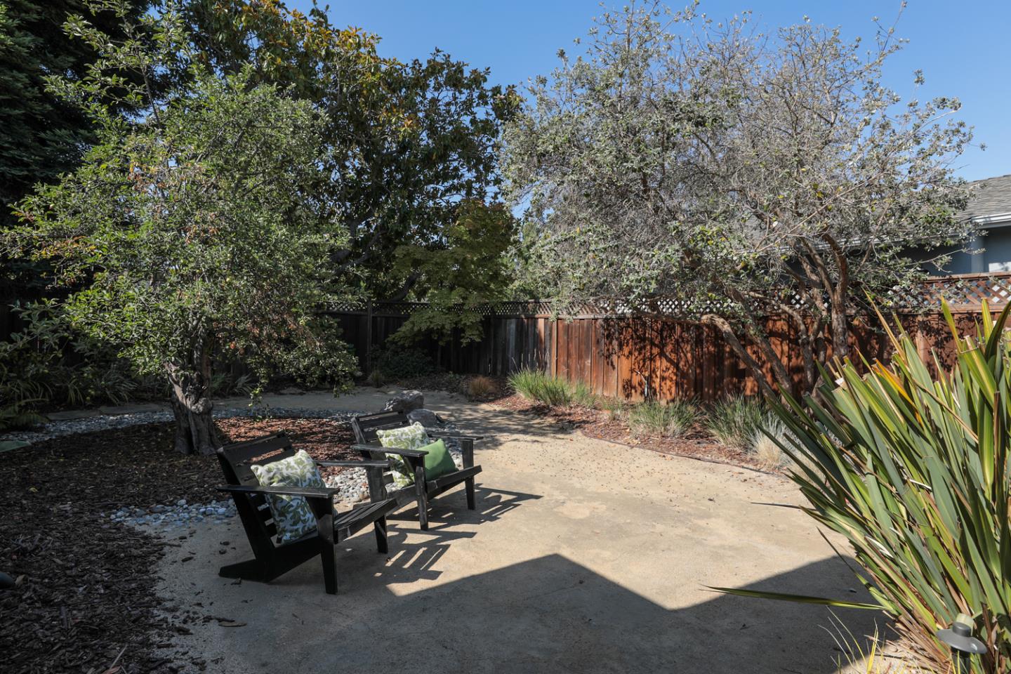 1722 Walnut Drive Mountain View, CA 94040 - Photo 21 of 35 a view of a backyard with sitting area