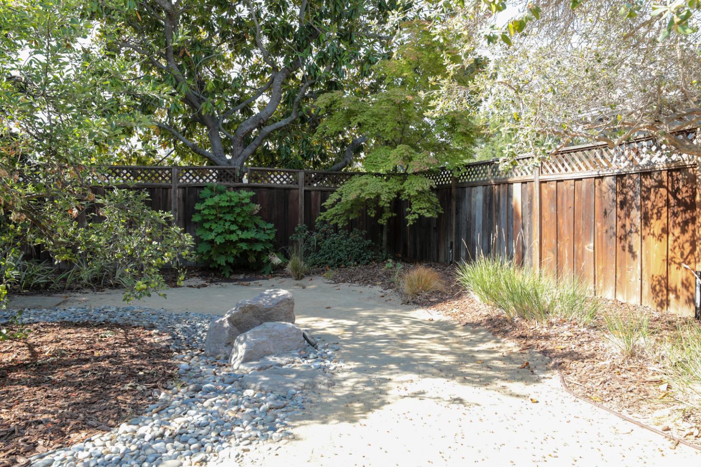 1722 Walnut Drive Mountain View, CA 94040 - Photo 22 of 35 a view of backyard and wooden fence