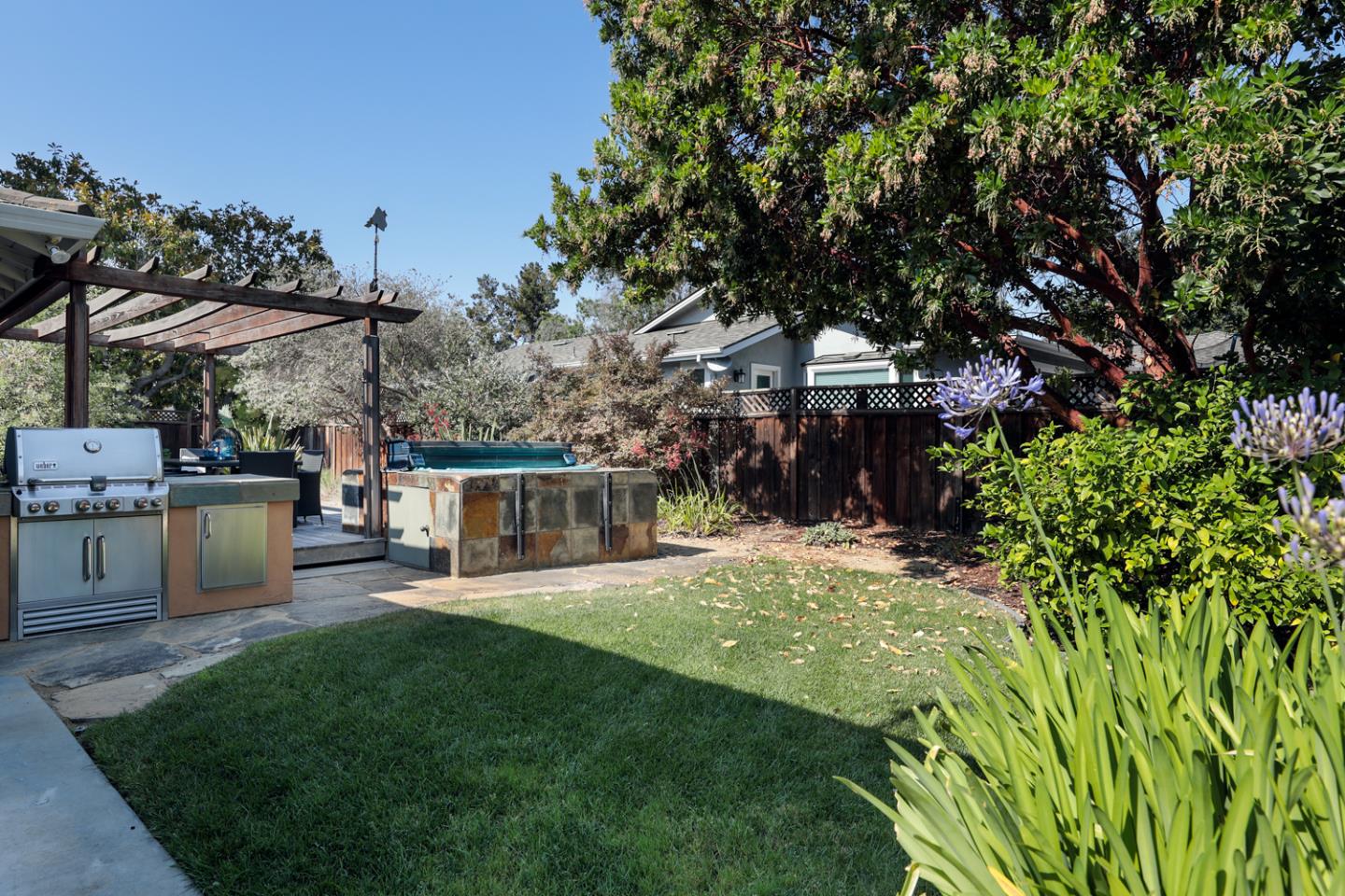 1722 Walnut Drive Mountain View, CA 94040 - Photo 29 of 35 a view of a house with a backyard porch and sitting area