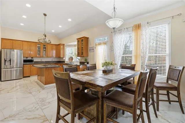 a view of a dining room with furniture