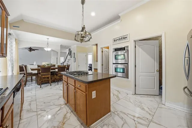 a bathroom with a double vanity sink mirror and
