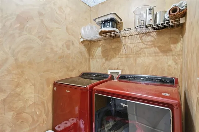 a spacious bedroom with a bed and a window