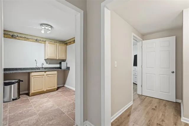 a view of balcony with wooden floor and outdoor space