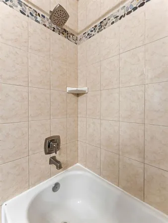 a bathroom with a sink and a shower