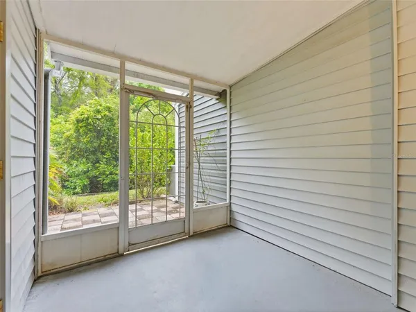 a view of a room with window and walls