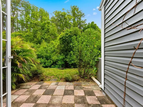 a view of a backyard with garden