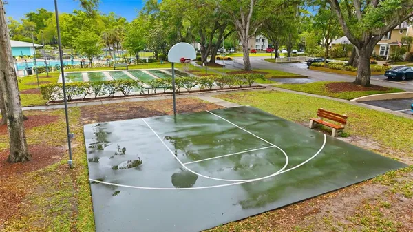 a view of a swimming pool with a patio