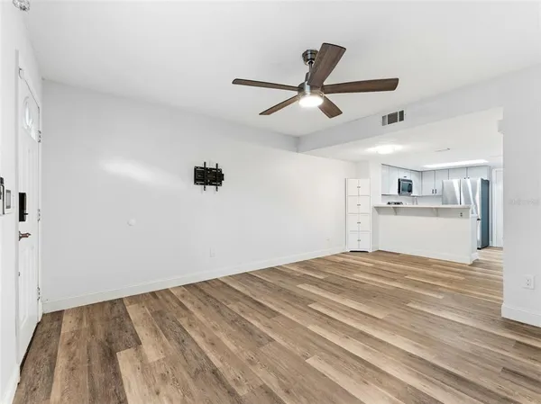 a view of a kitchen with a sink and dishwasher