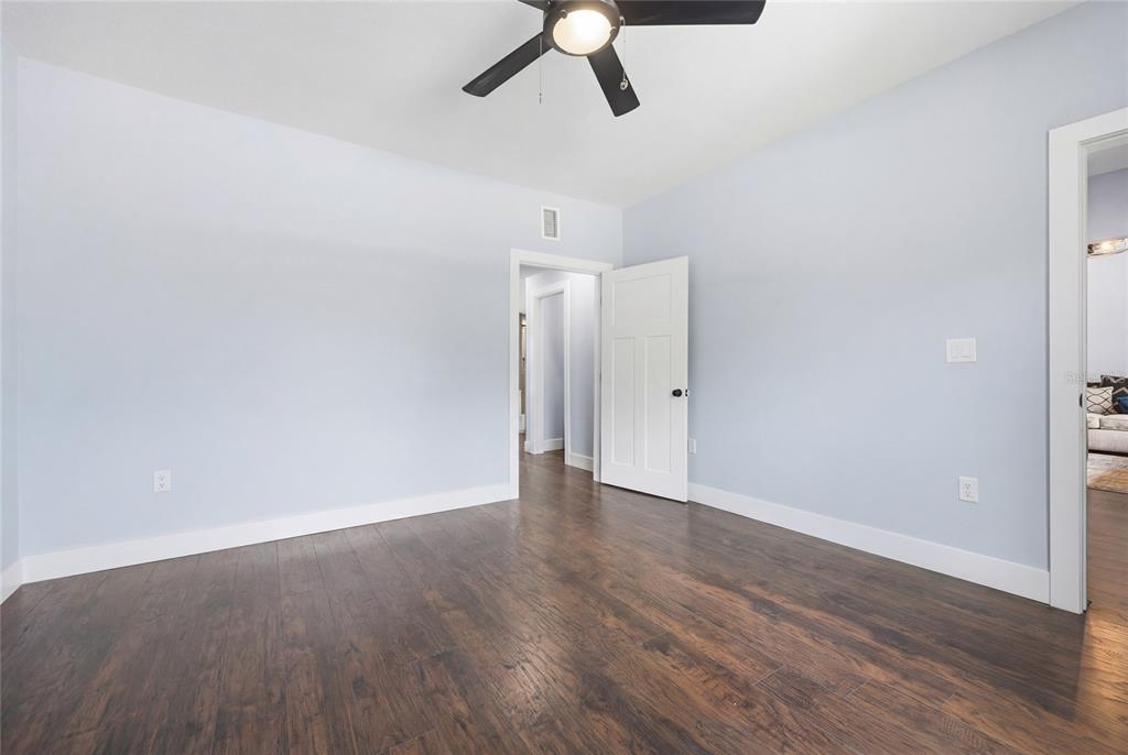 403 Northeast 9th Street Gainesville, FL 32601 - Photo 26 of 62 wooden floor in an empty room