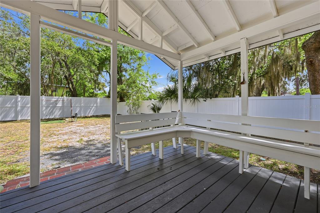 403 Northeast 9th Street Gainesville, FL 32601 - Photo 52 of 62 a view of a swimming pool with a porch