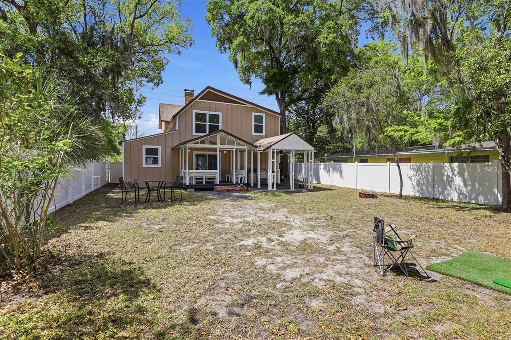 403 Northeast 9th Street Gainesville, FL 32601 - Photo 57 of 62 a front view of a house with a yard