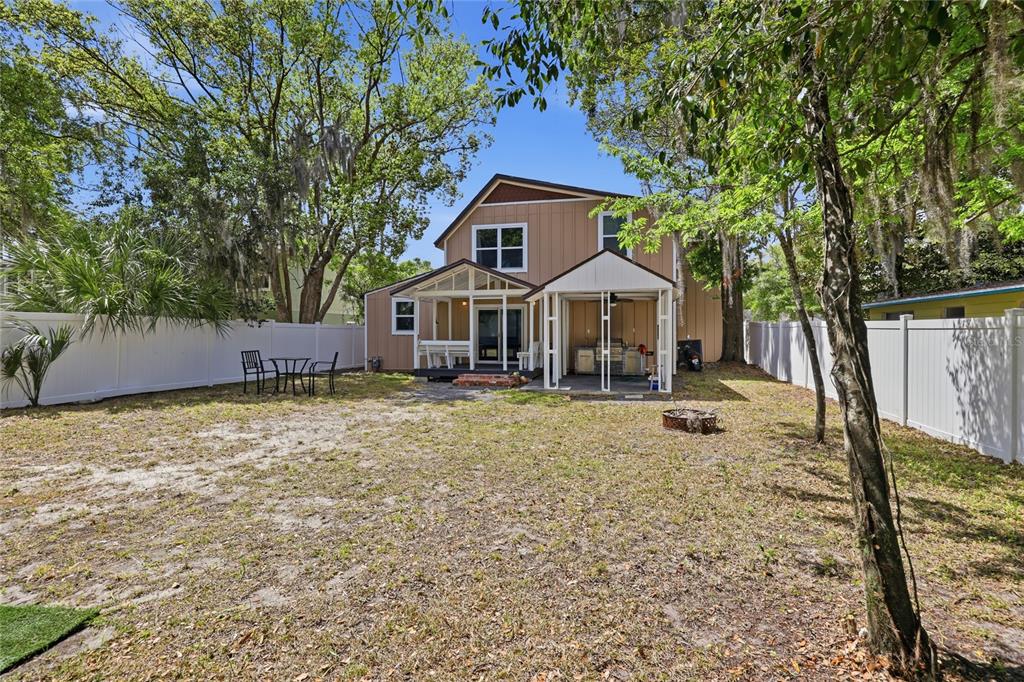 403 Northeast 9th Street Gainesville, FL 32601 - Photo 58 of 62 a front view of a house with a yard