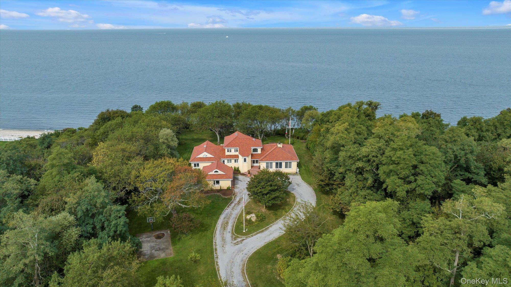 3400 Dignans Road Cutchogue, NY 11935 - Photo 49 of 50 Aerial view of property and surrounding area with a nearby body of water