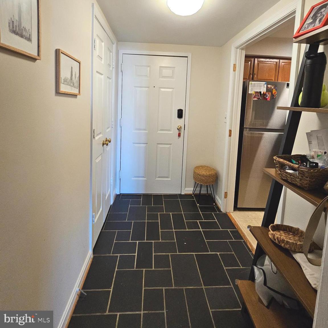 505 East Braddock Road, Unit 608 Alexandria, VA 22314 - Photo 5 of 15 a bathroom with a glass door shower and a mirror