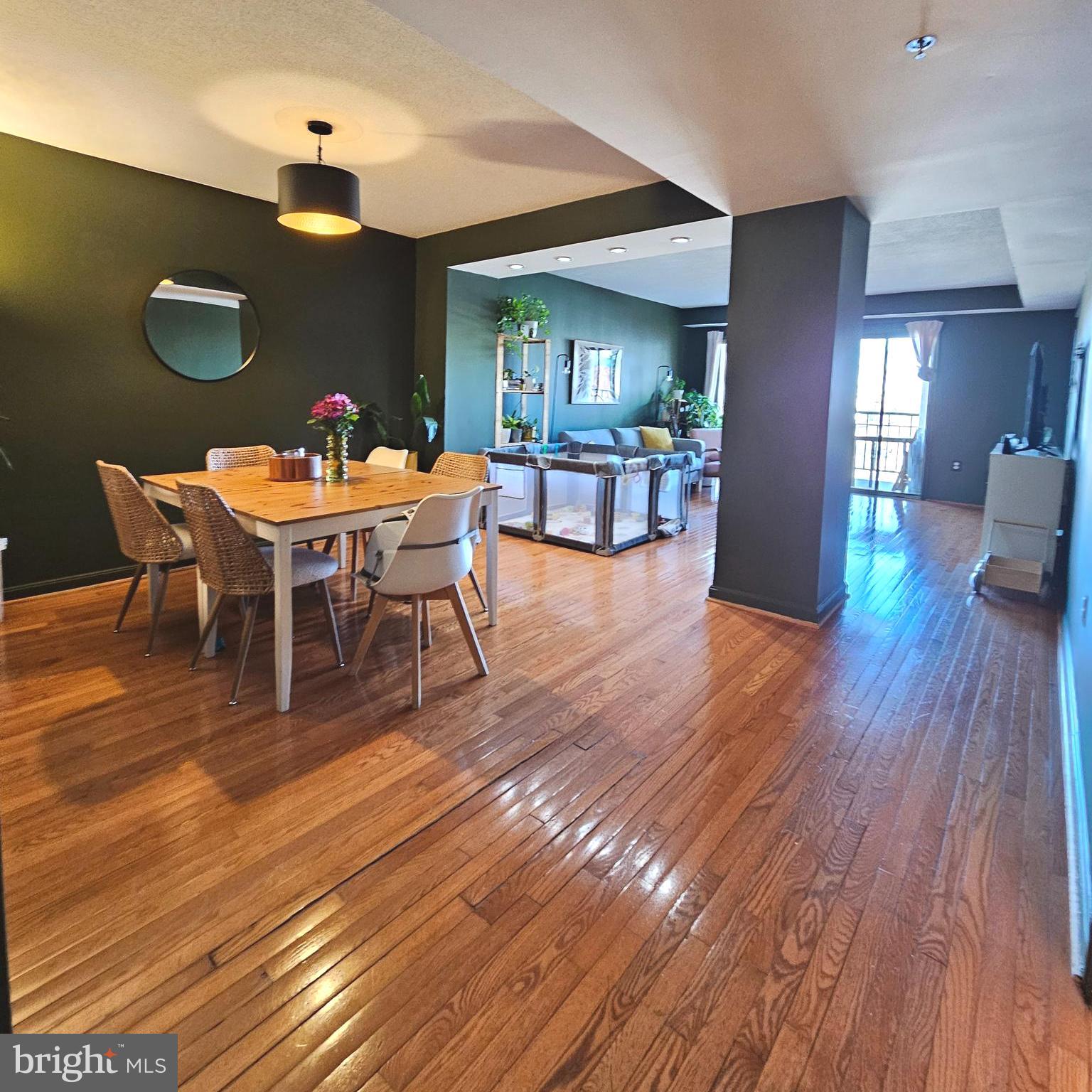 505 East Braddock Road, Unit 608 Alexandria, VA 22314 - Photo 6 of 15 a view of a dining room with furniture and wooden floor