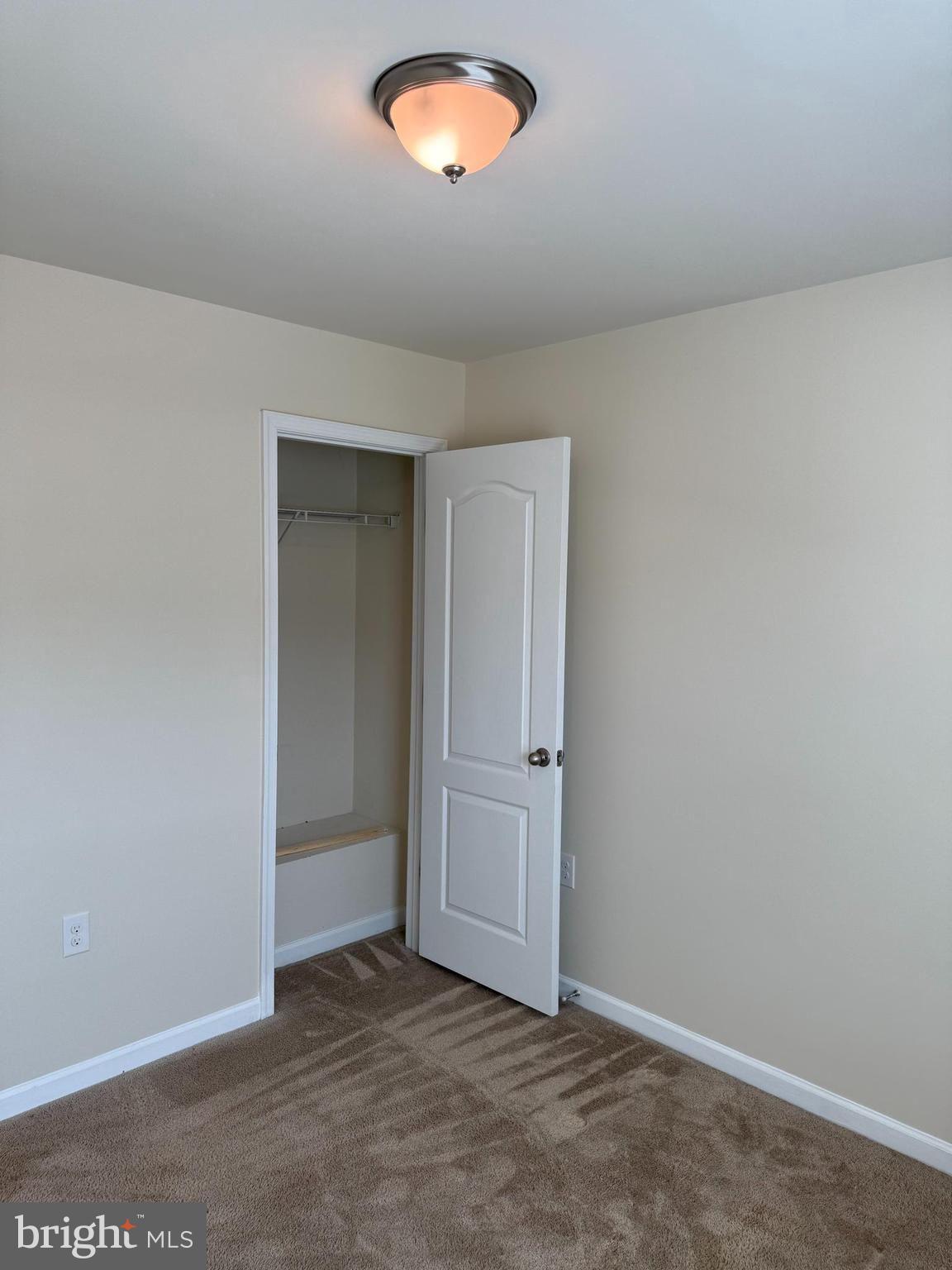 1130 Stallion Street Ranson, WV 25438 - Photo 14 of 24 an empty room with a fan