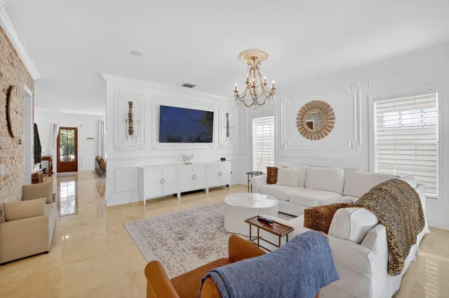 a kitchen with stainless steel appliances granite countertop a stove a microwave and cabinets