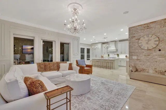 a bathroom with a bathtub a sink and a large mirror