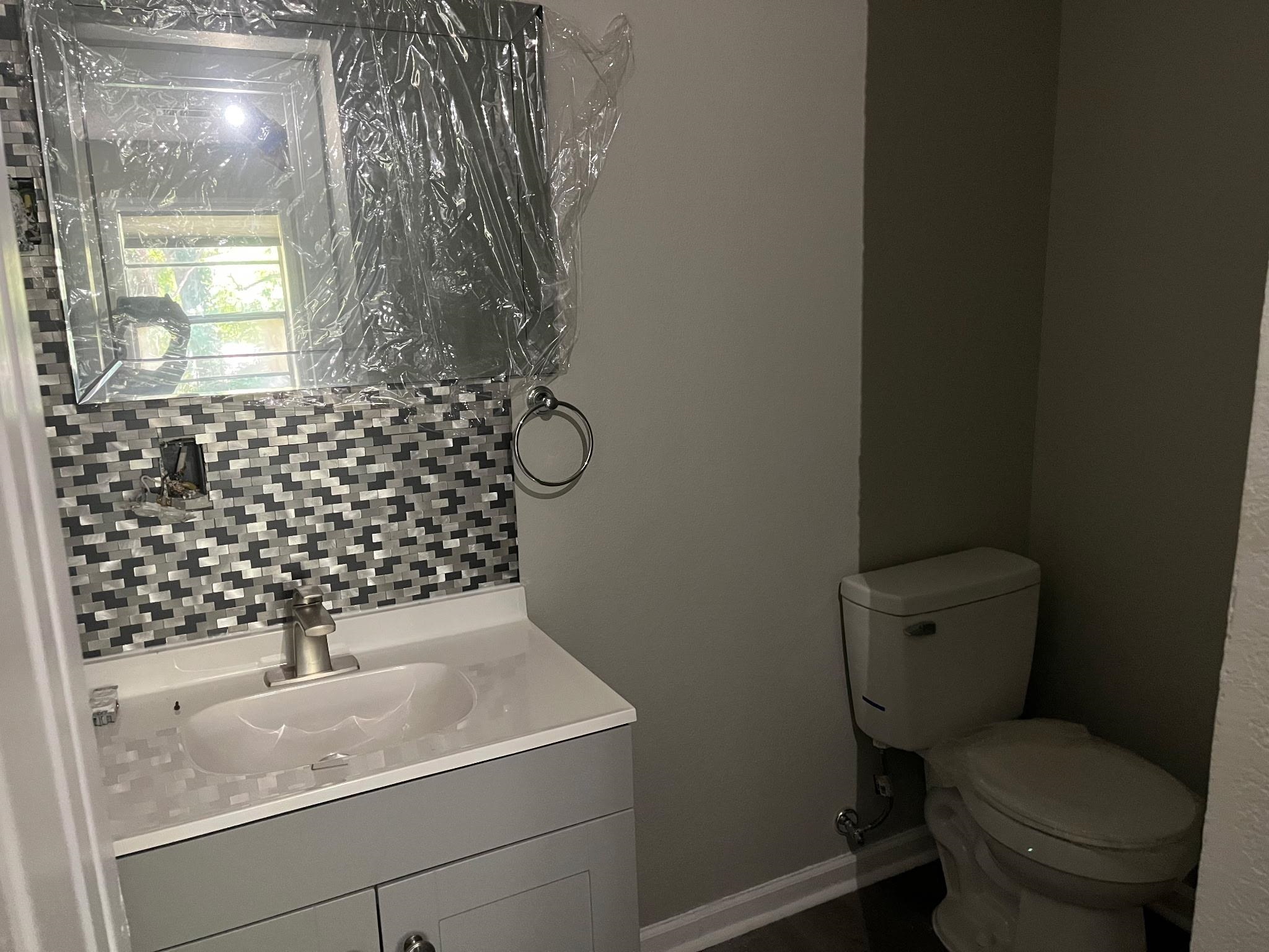 518 Harahan Road Memphis, TN 38109 - Photo 9 of 9 Bathroom featuring vanity and baseboards