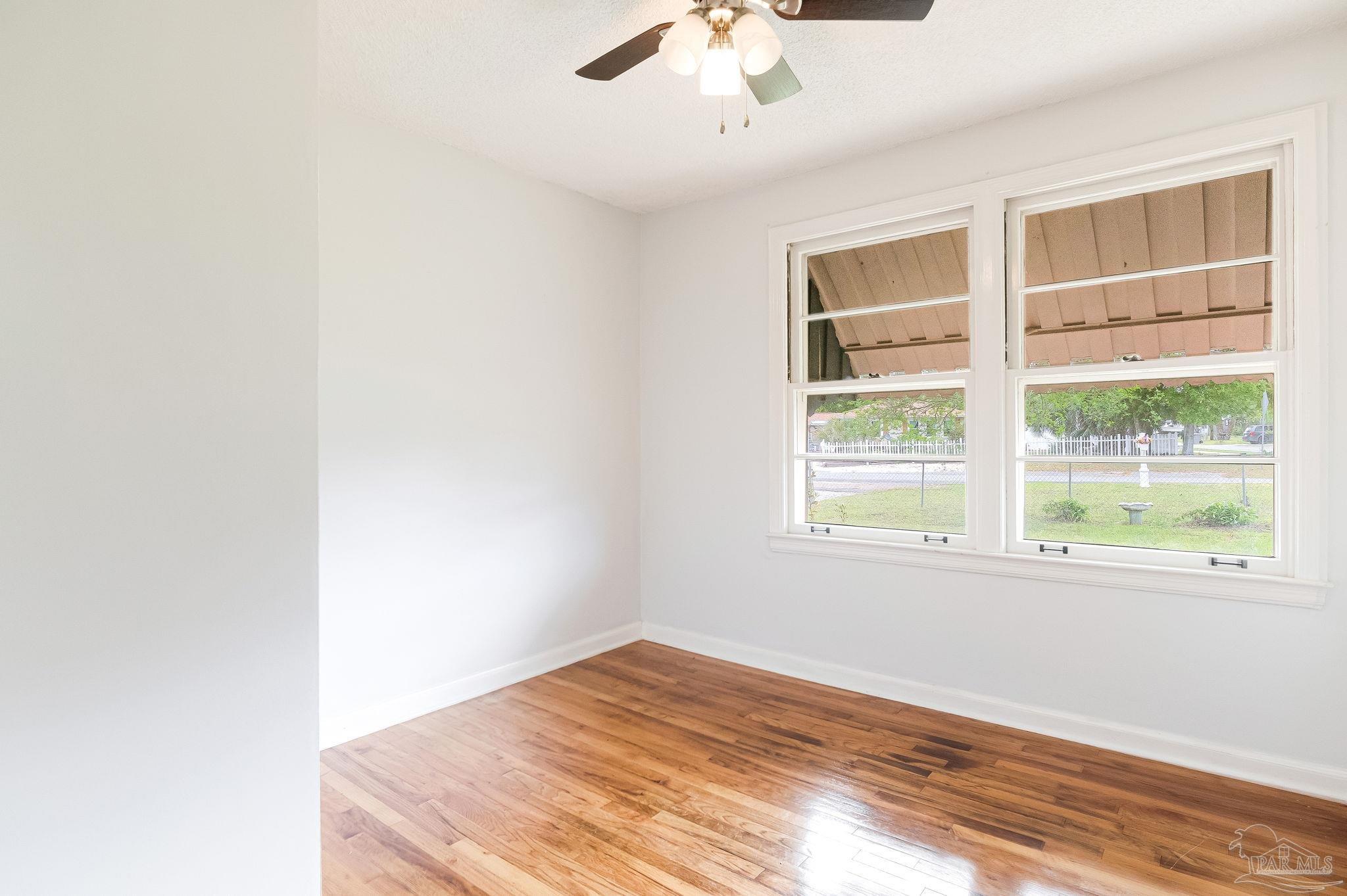 629 Rue Max Street Pensacola, FL 32507 - Photo 17 of 28 an empty room with a window