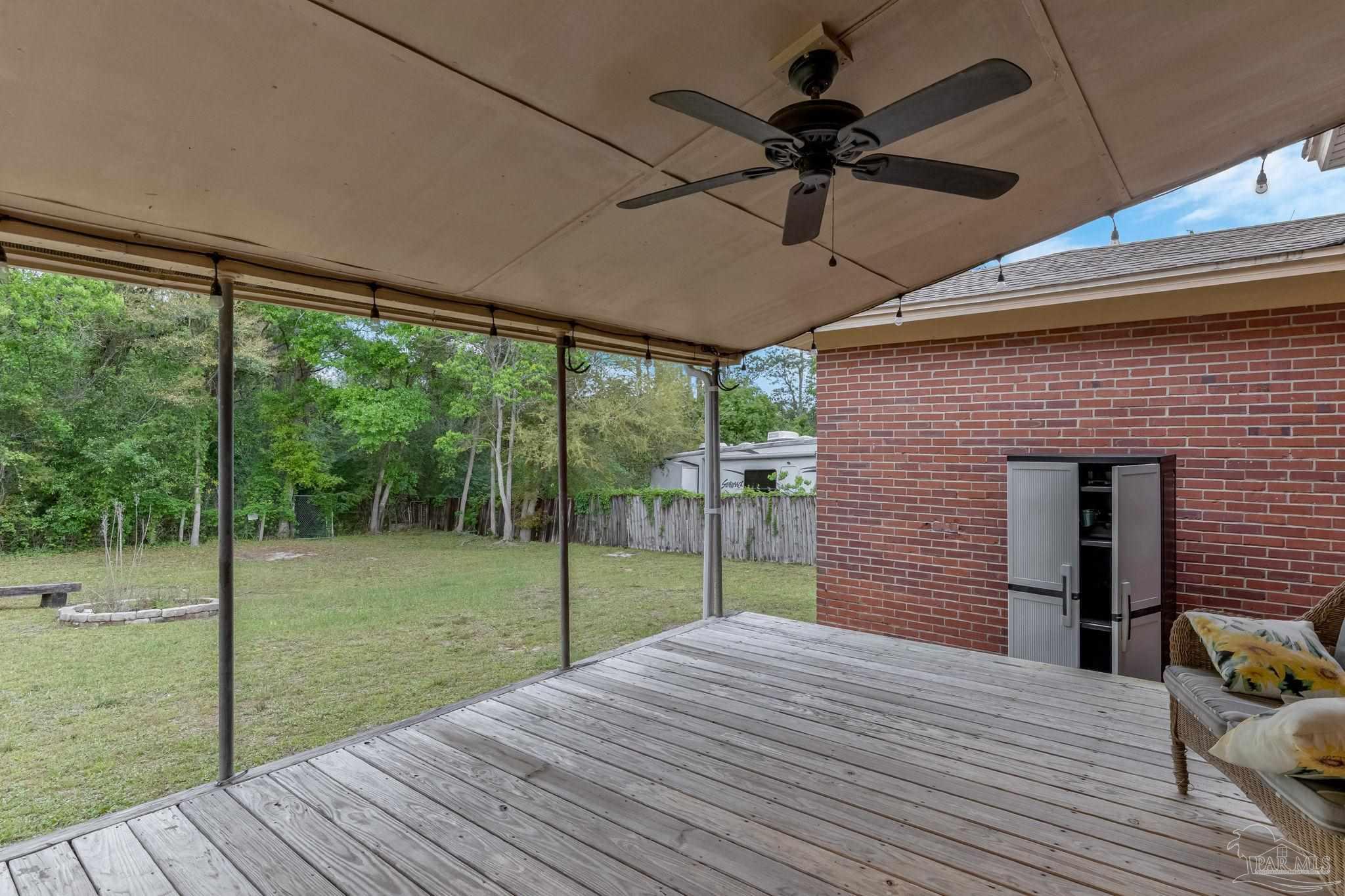 629 Rue Max Street Pensacola, FL 32507 - Photo 22 of 28 a view of a backyard of a house