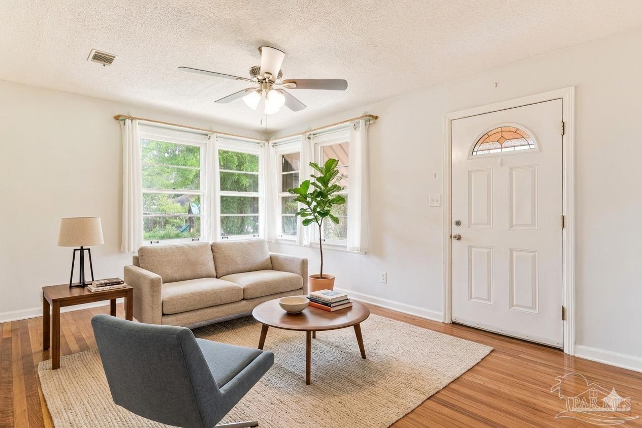 629 Rue Max Street Pensacola, FL 32507 - Photo 3 of 28 a living room with furniture and a window