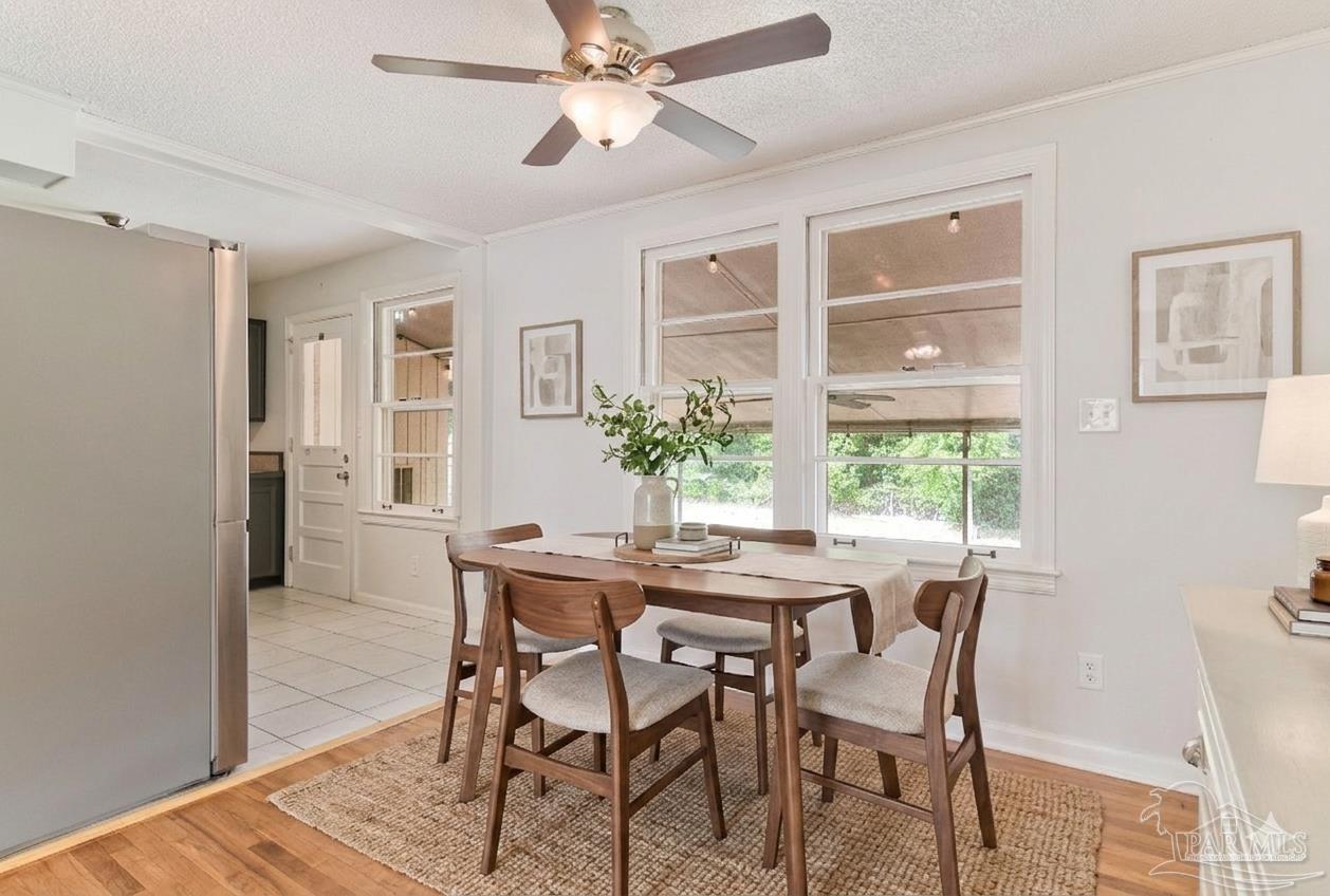 629 Rue Max Street Pensacola, FL 32507 - Photo 5 of 28 a dining room with furniture and window