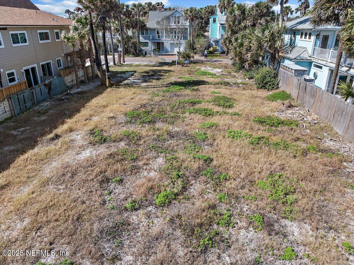 1039 Beach Avenue Atlantic Beach, FL 32233 - Photo 7 of 9 a view of residential houses with yard and pathway