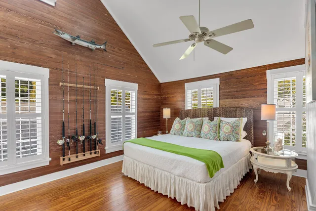 a bedroom with bed and window