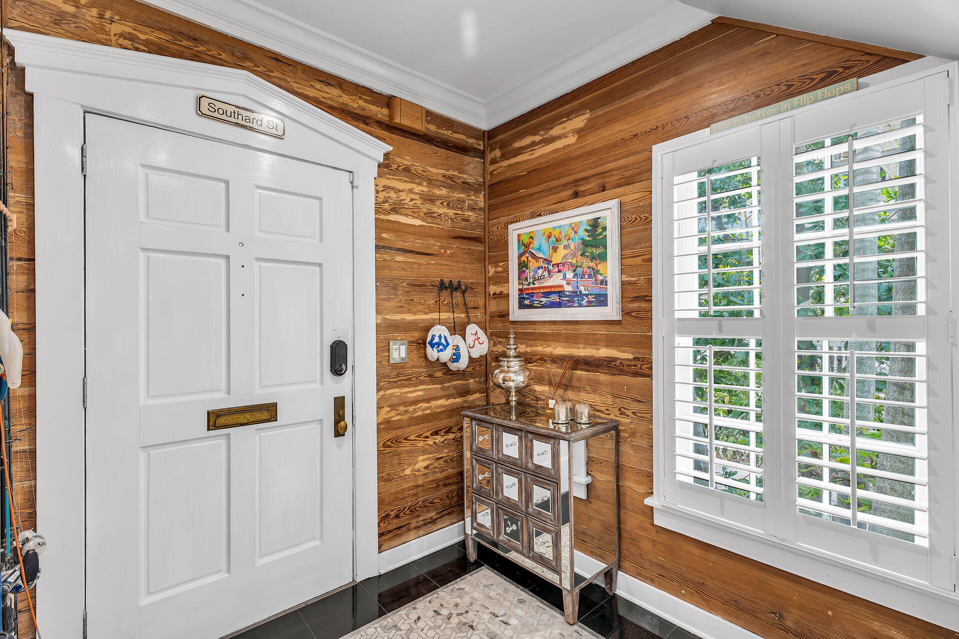 717 Southard Street Key West, FL 33040 - Photo 6 of 36 a view of an entryway with wooden floor