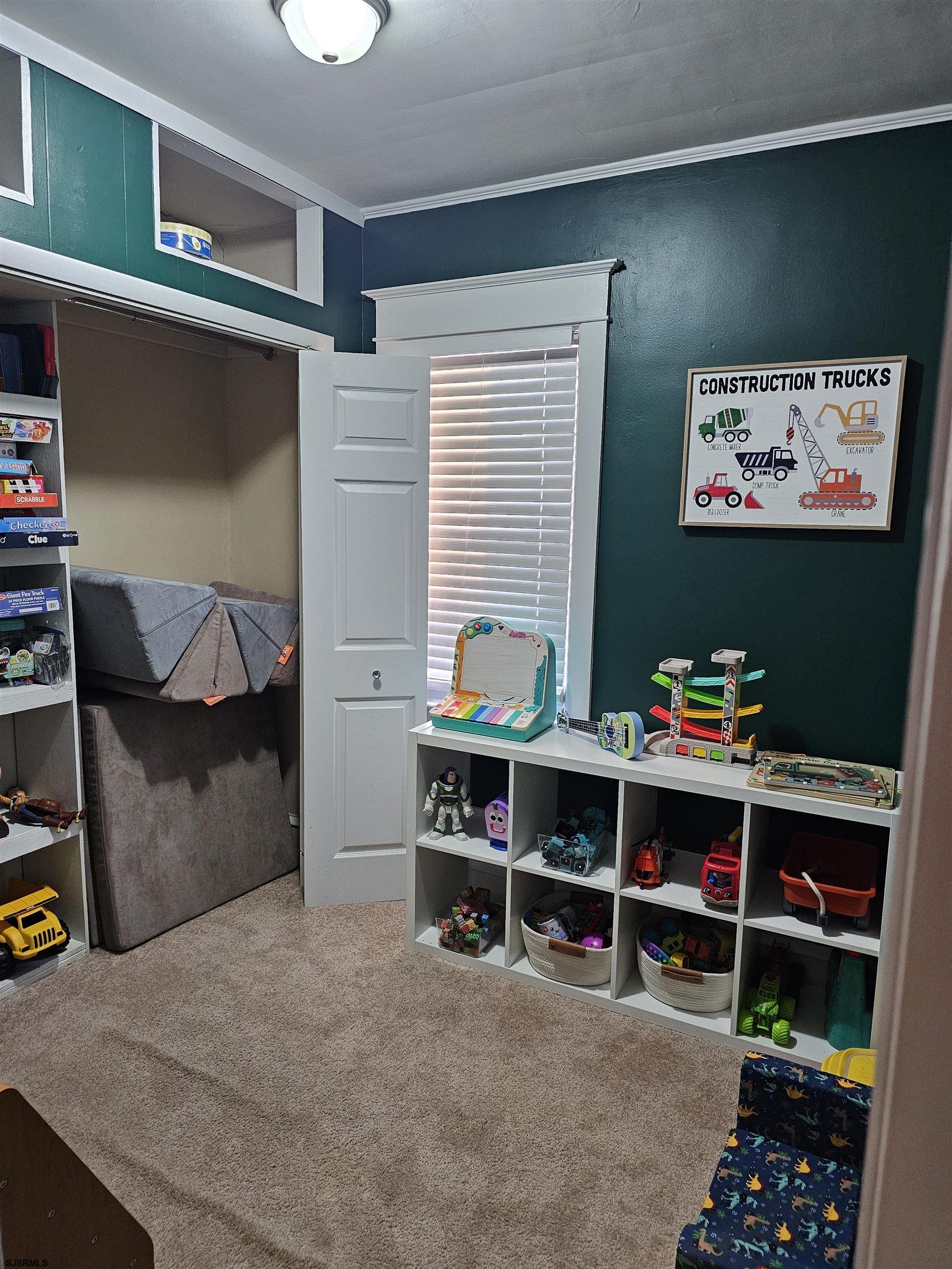 216 Marlin Road Absecon, NJ 08201 - Photo 13 of 20 a view of a livingroom with shelves