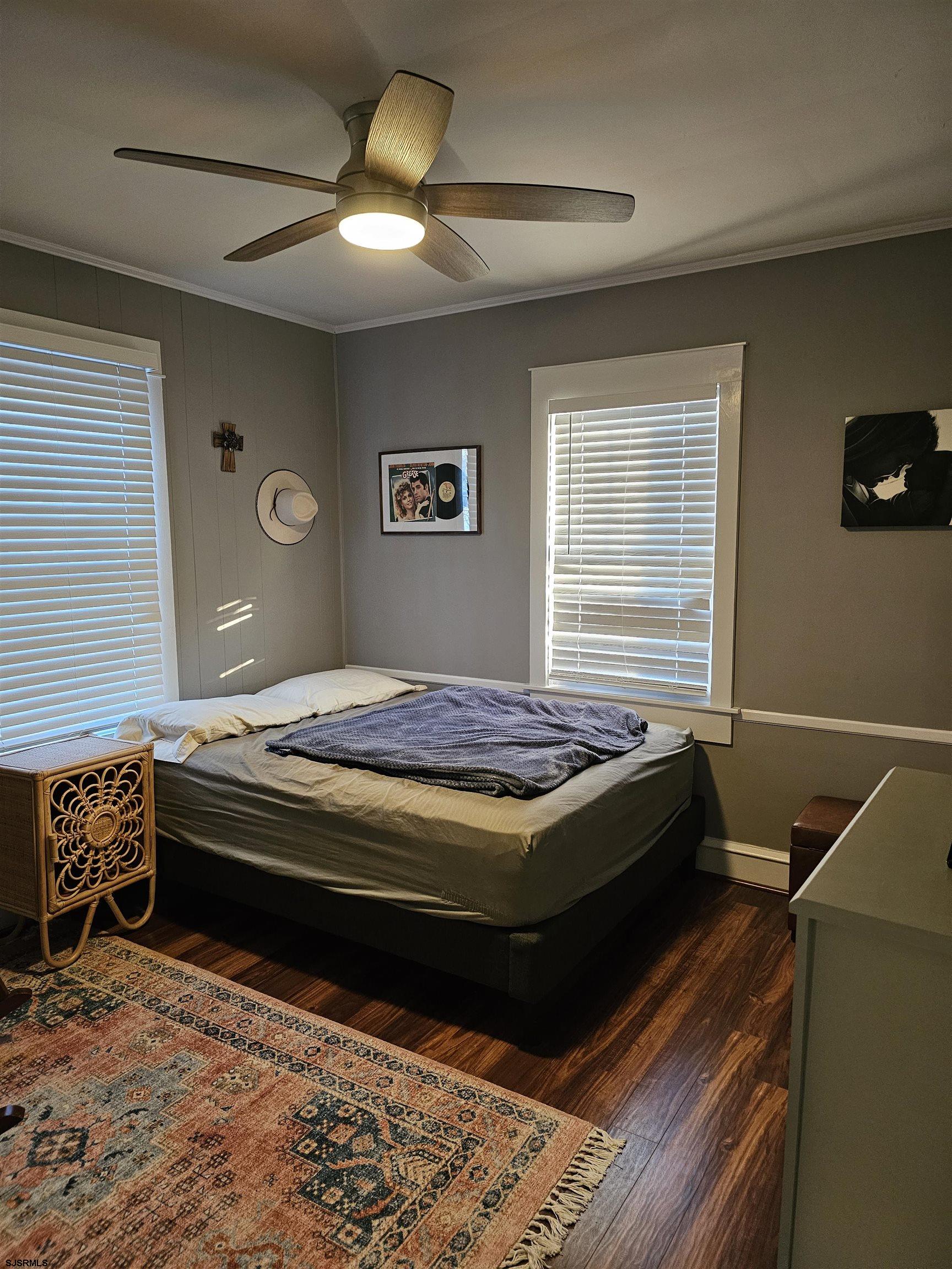 216 Marlin Road Absecon, NJ 08201 - Photo 14 of 20 a bed sitting in a bedroom next to a window