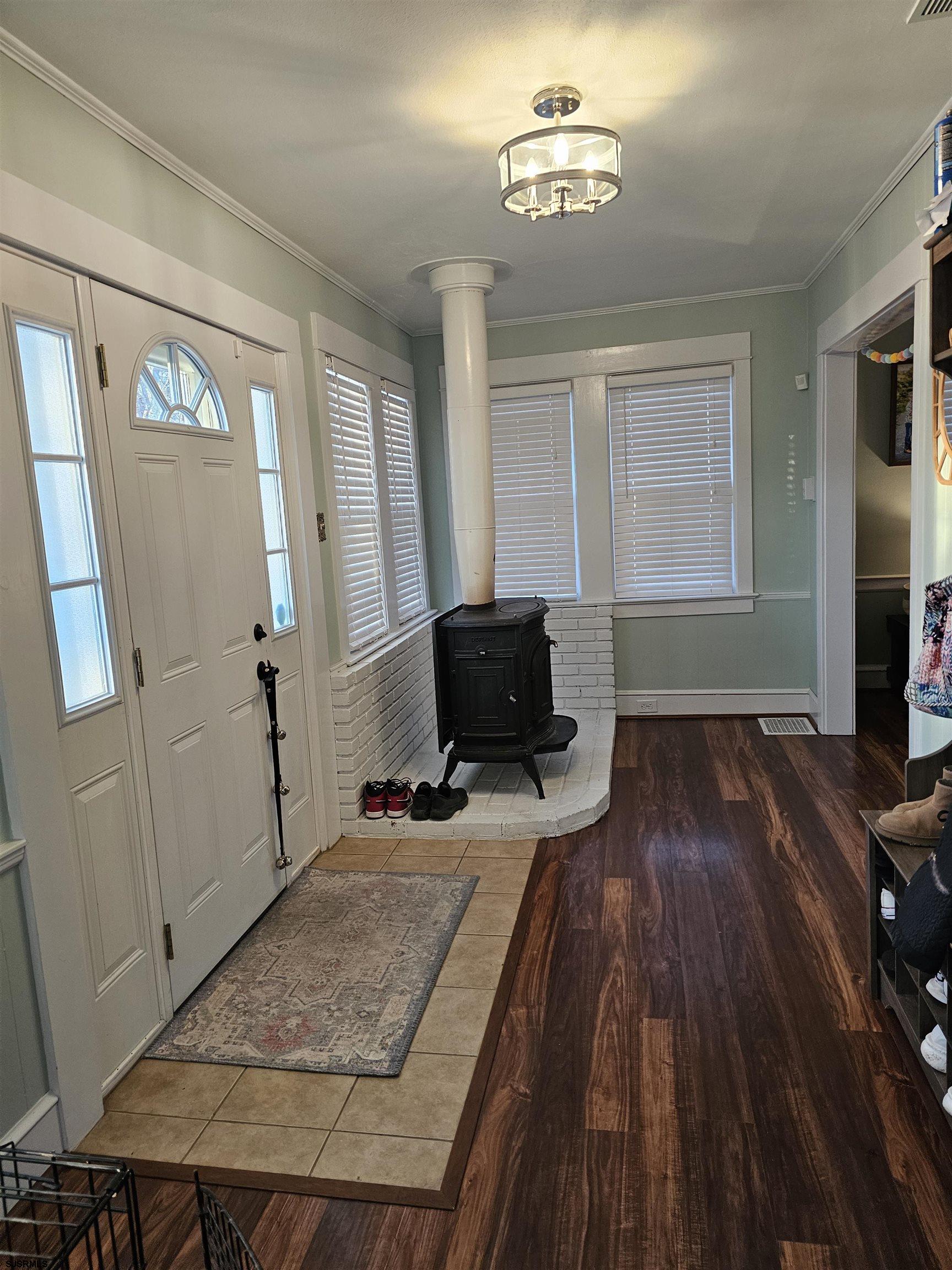 216 Marlin Road Absecon, NJ 08201 - Photo 4 of 20 a living room with furniture and a flat screen tv