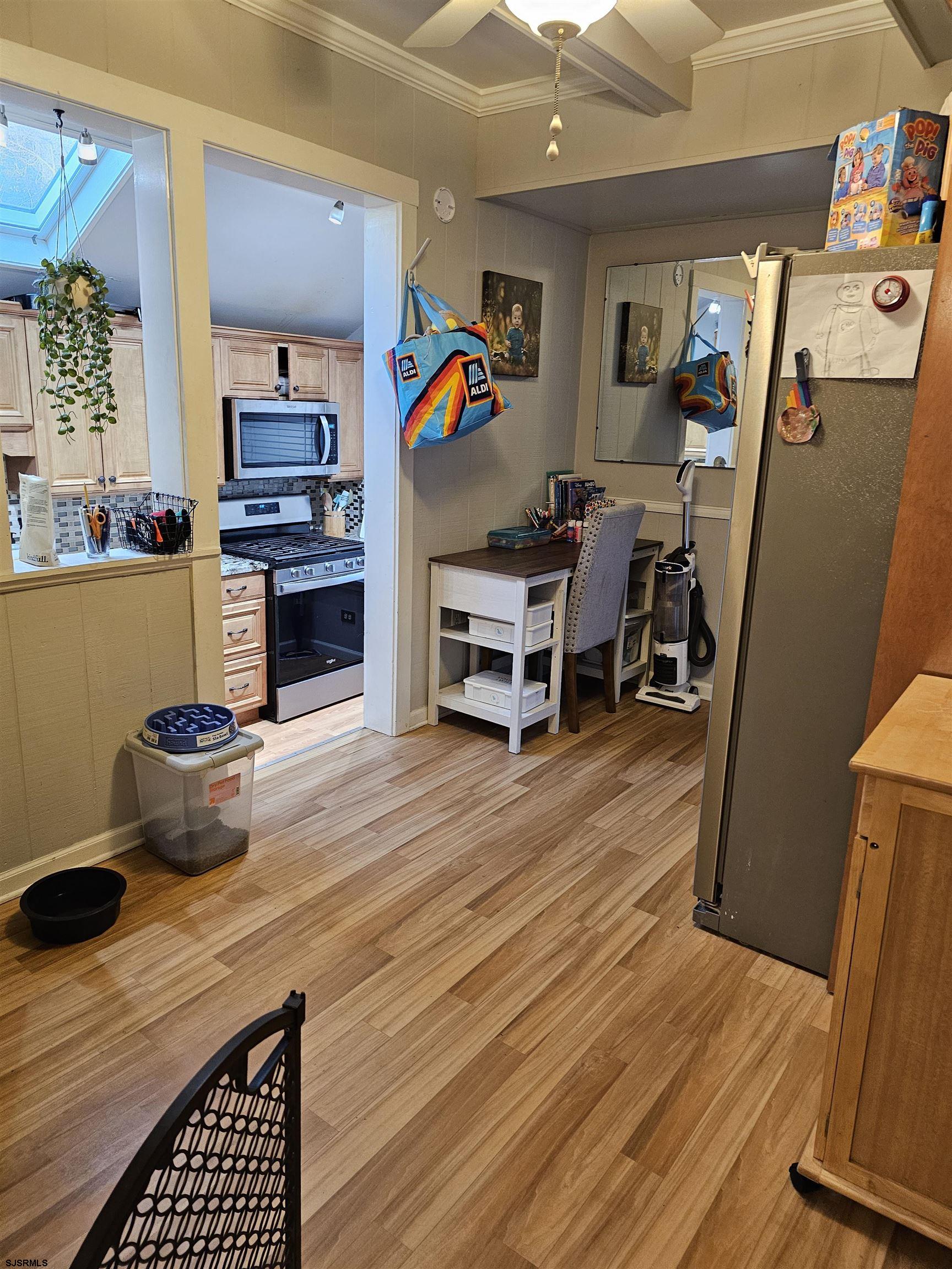 216 Marlin Road Absecon, NJ 08201 - Photo 6 of 20 a living room with furniture and a wooden floor