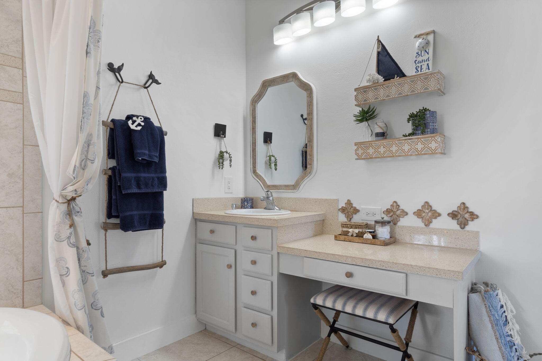 157 Baird Road Santa Rosa Beach, FL 32459 - Photo 36 of 93 a bathroom with a sink vanity and mirror