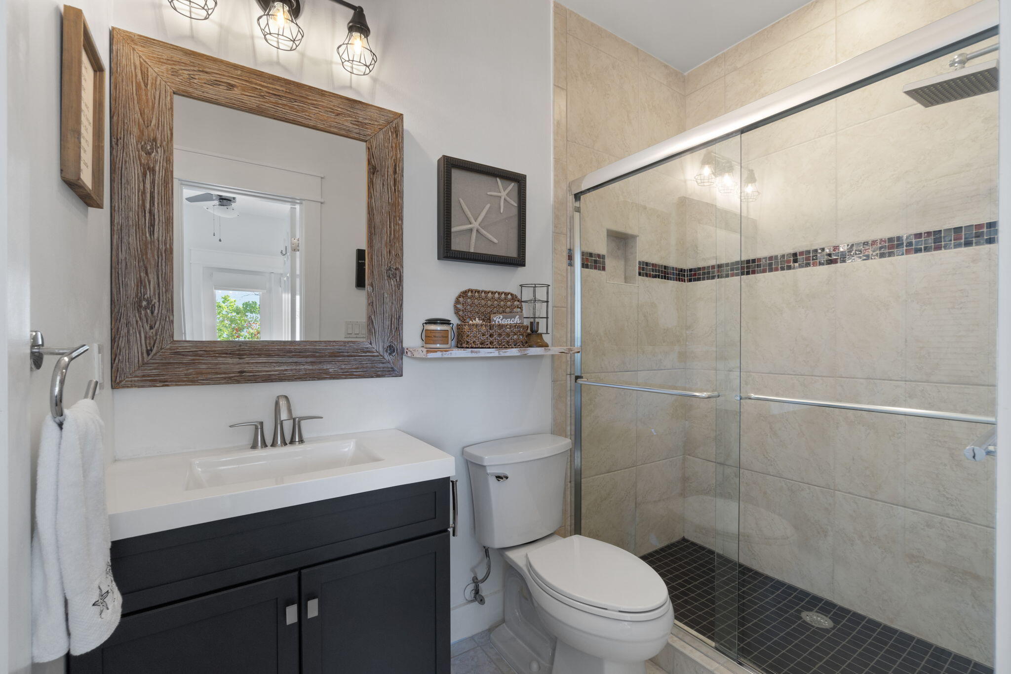 157 Baird Road Santa Rosa Beach, FL 32459 - Photo 40 of 93 a bathroom with a sink a toilet and shower