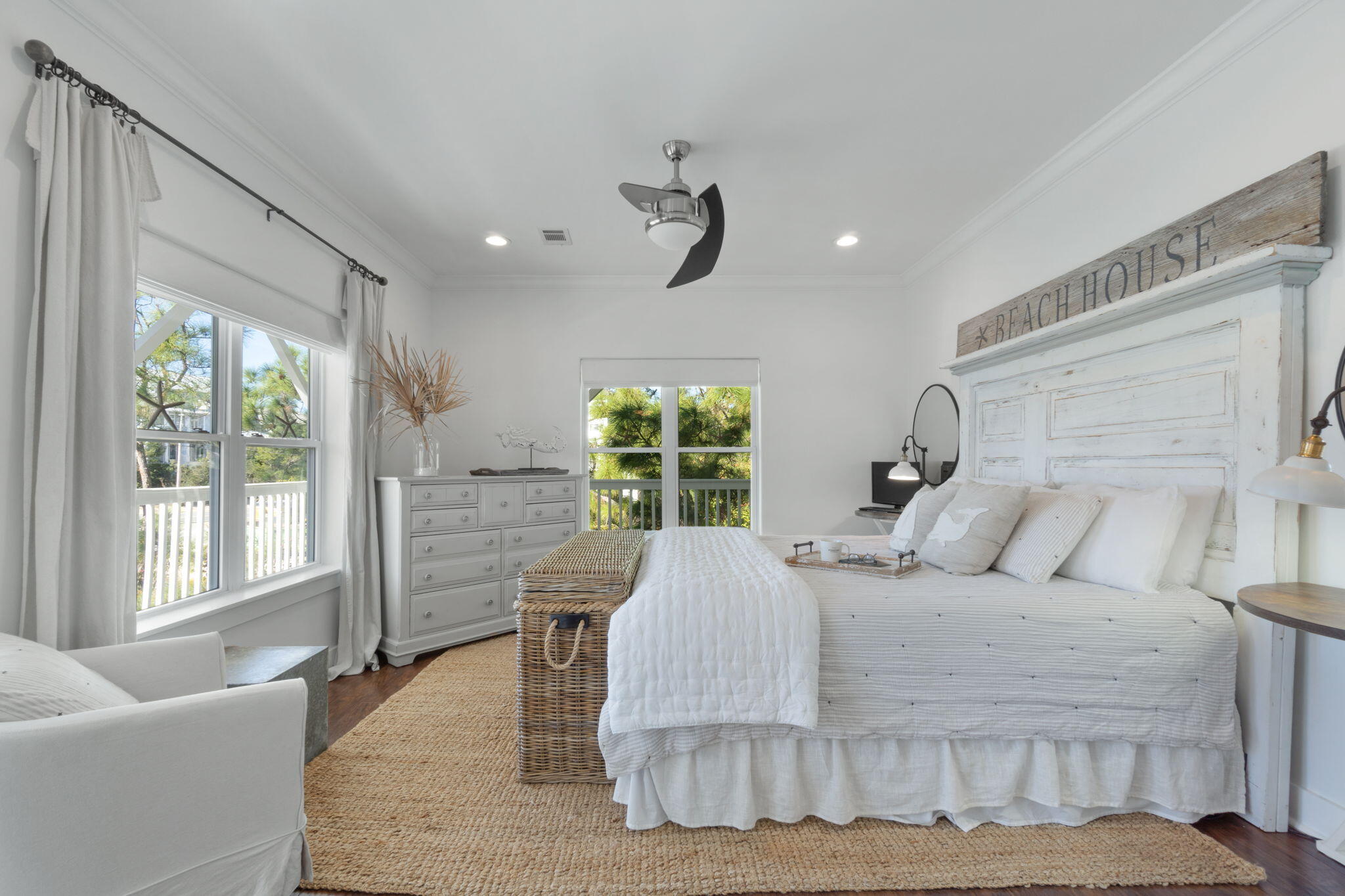 157 Baird Road Santa Rosa Beach, FL 32459 - Photo 48 of 93 a bedroom with a large bed and a large window