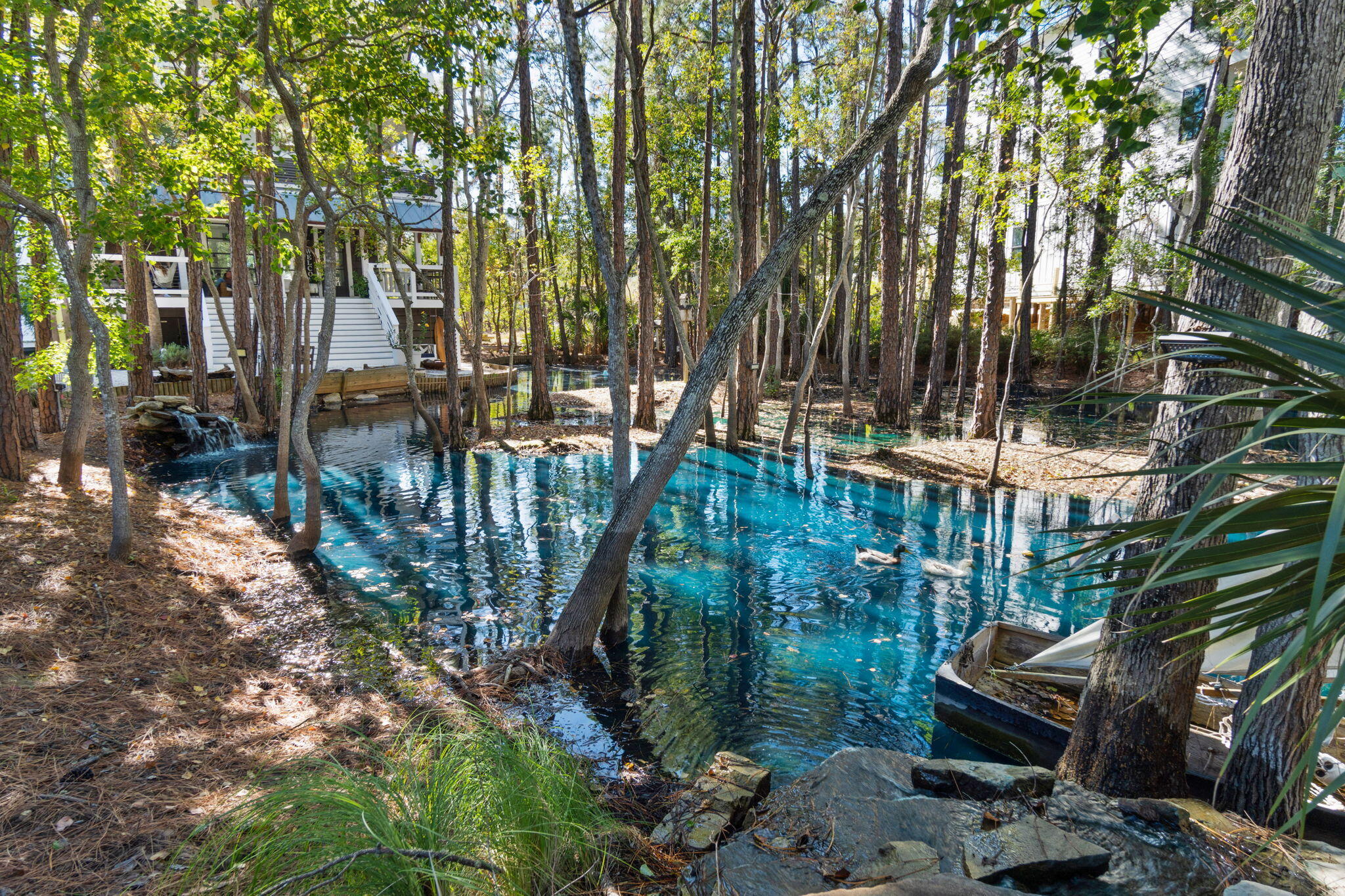 157 Baird Road Santa Rosa Beach, FL 32459 - Photo 78 of 93 a backyard of a house with lots of green space and fountain