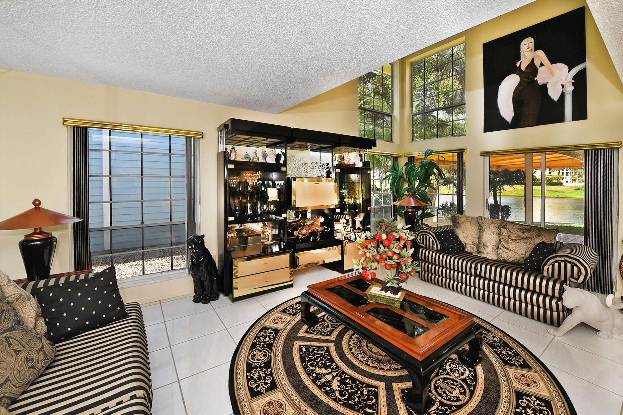 5135 Pointe Alexis Boca Raton, FL 33431 - Photo 5 of 35 a very nice looking room with a large window