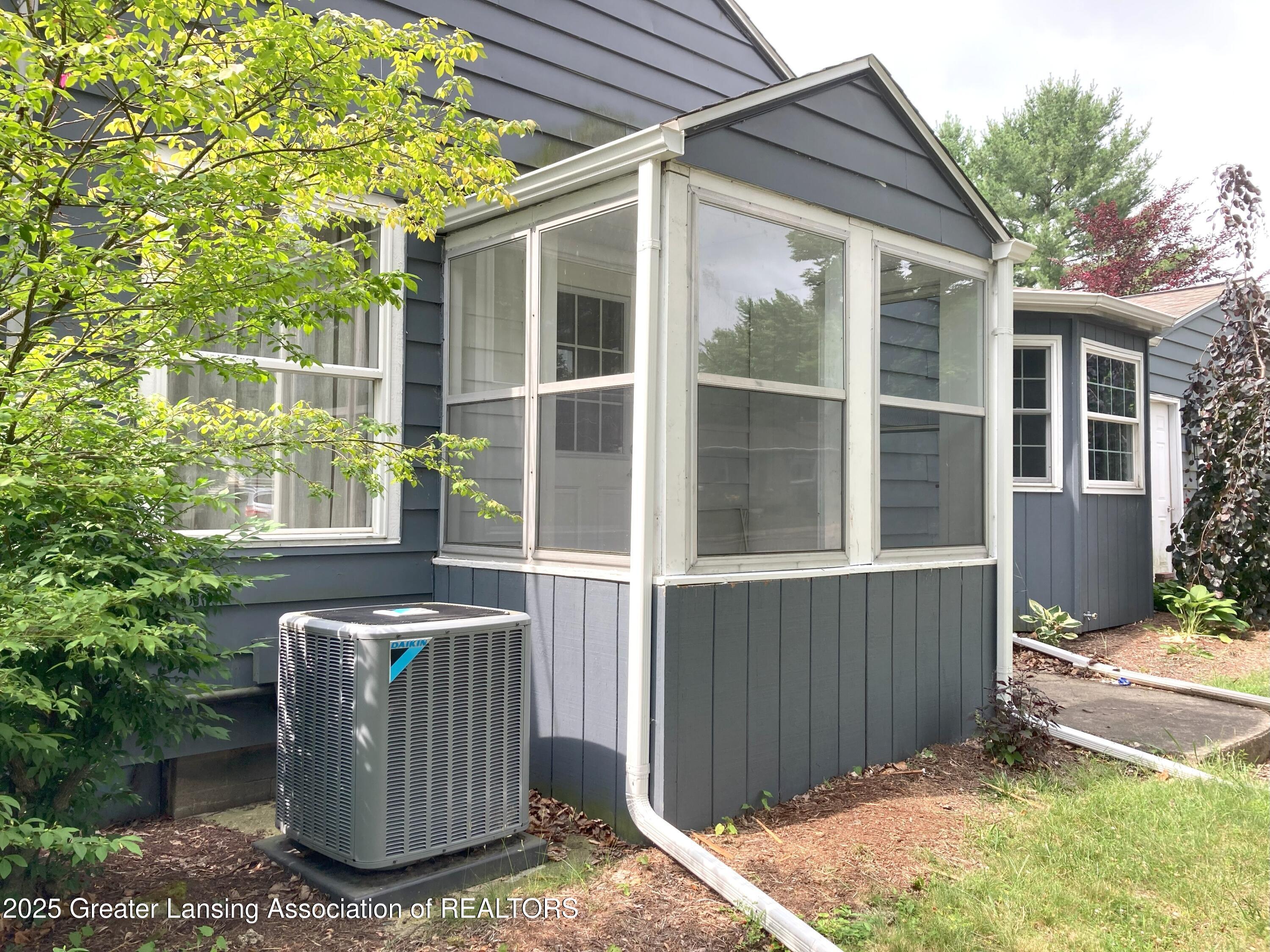 500 Spring Street Grand Ledge, MI 48837 - Photo 33 of 40 33 Side Porch and AC unit