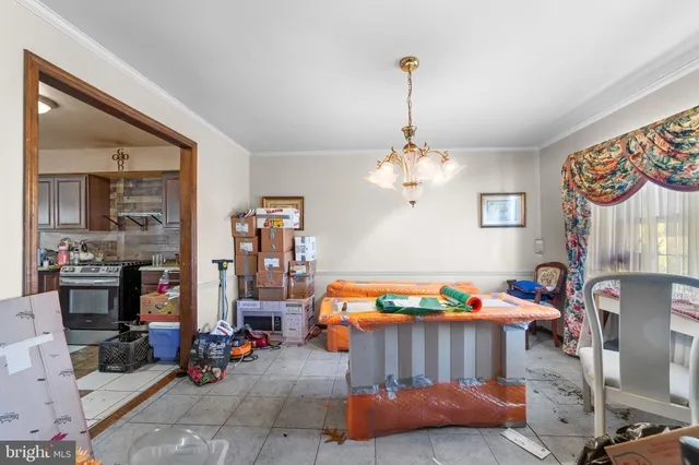 a bedroom with bed and window