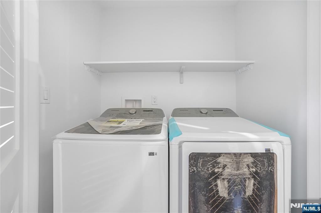 762 Williams Place, Unit A Cliffside Park, NJ 07010 - Photo 21 of 30 a utility room with dryer and washer