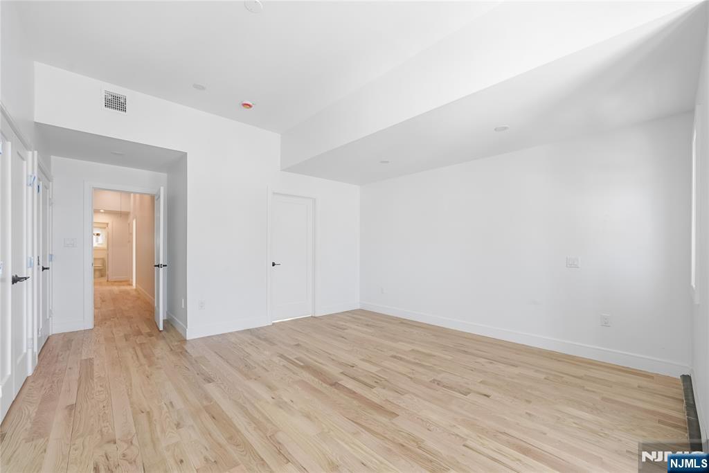 762 Williams Place, Unit A Cliffside Park, NJ 07010 - Photo 23 of 30 a view of a room with wooden floor