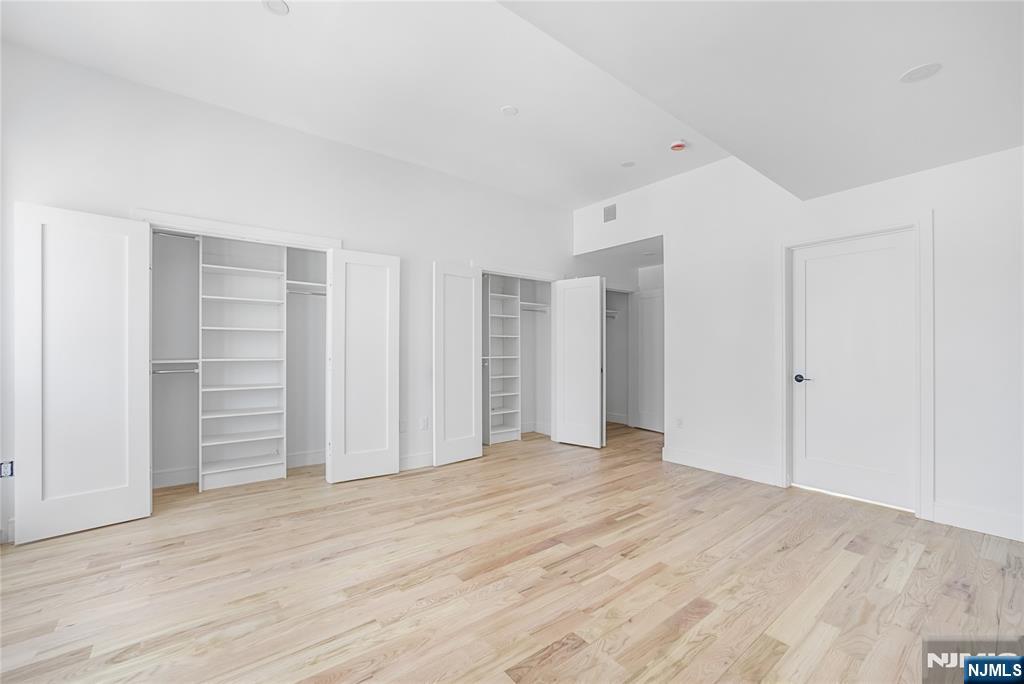 762 Williams Place, Unit A Cliffside Park, NJ 07010 - Photo 24 of 30 a view of empty room with wooden floor and entryway