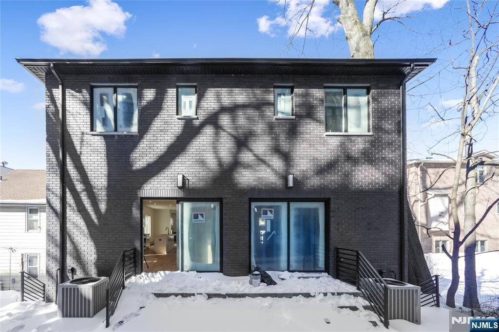 762 Williams Place, Unit A Cliffside Park, NJ 07010 - Photo 29 of 30 a front view of a house with parking area