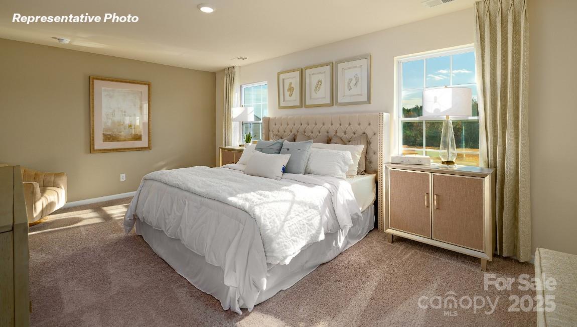 3844 Maxwell Henry Lane Northwest Conover, NC 28613 - Photo 12 of 30 a bedroom with a bed and a window